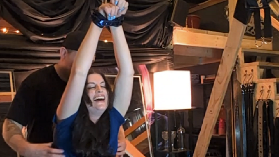 Nurse Tickled with Wrists Above Head